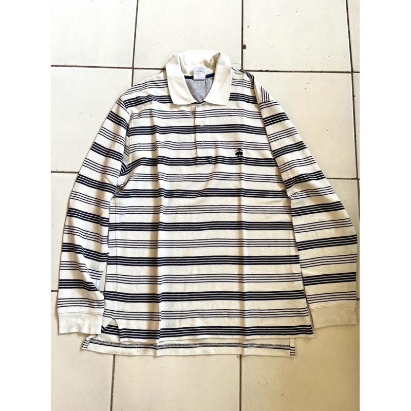 Polo putih garis garis