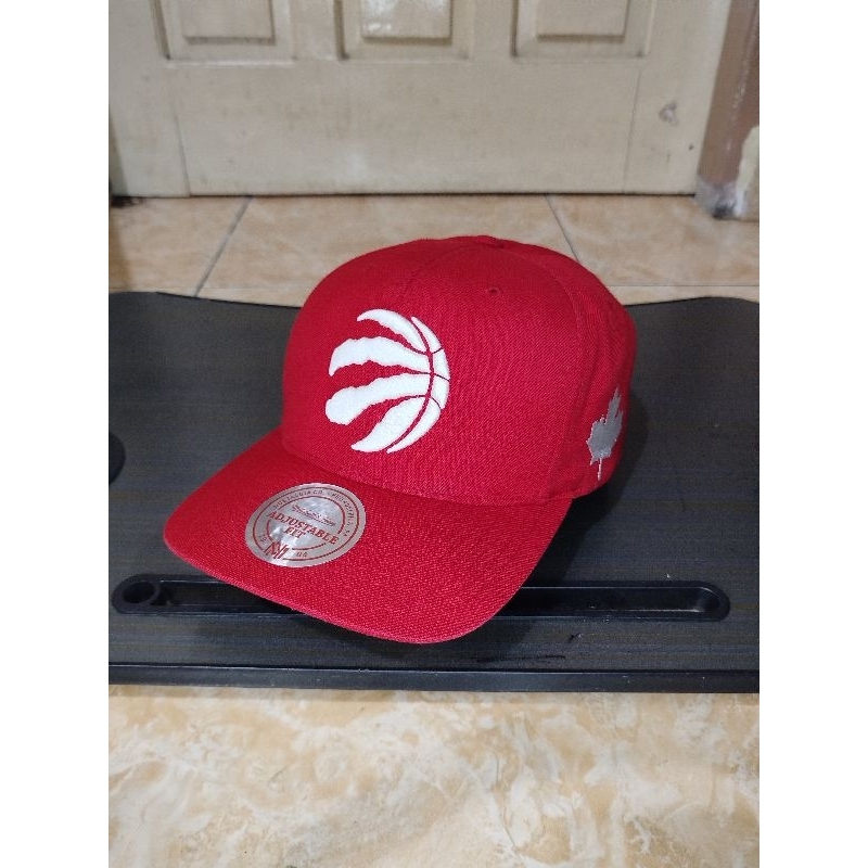 Topi Mitchell and ness