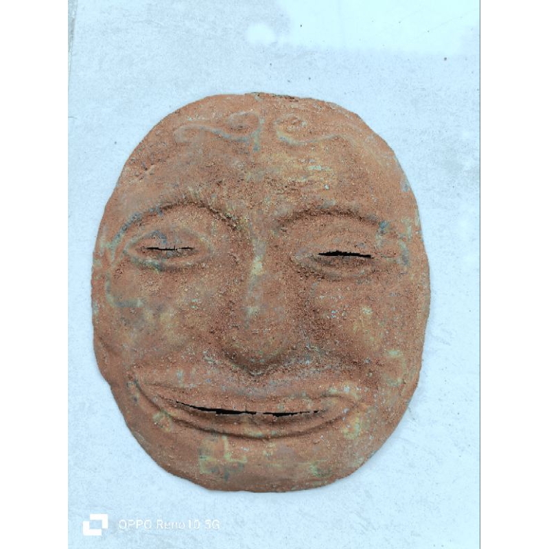 topeng perunggu kuno barang temuan darat