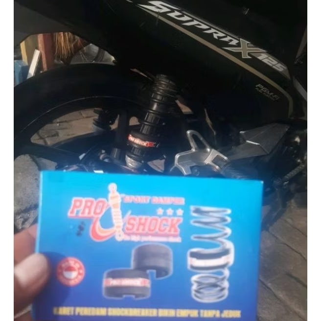 Karet shock damper motor SUPRA X - 125 injeksi