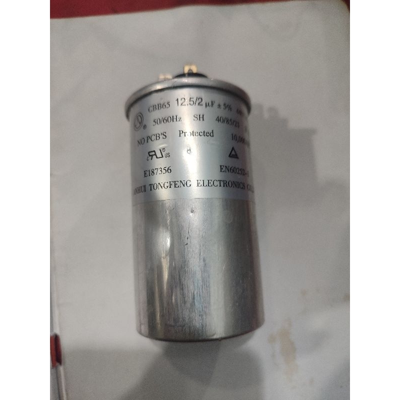 Ay00 Kapasitor ac panasonic 12,5/2uf 1/2pk r32 cabutan