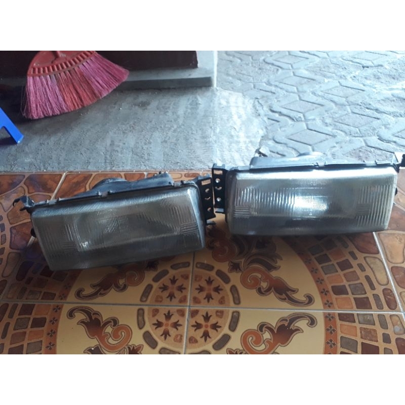 Lampu depan ford laser sonik/gala/champ