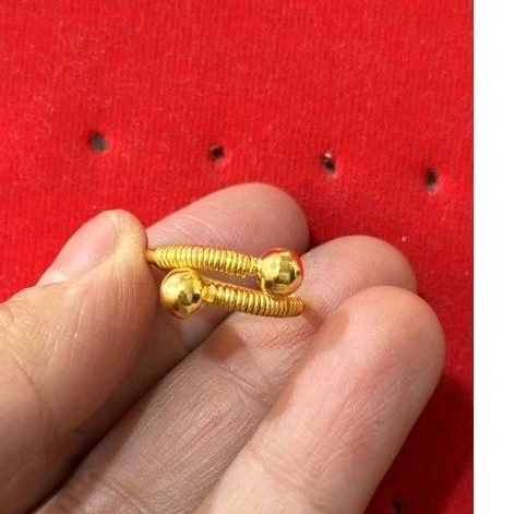 cincin putar emas 24k kadar 99,99%.