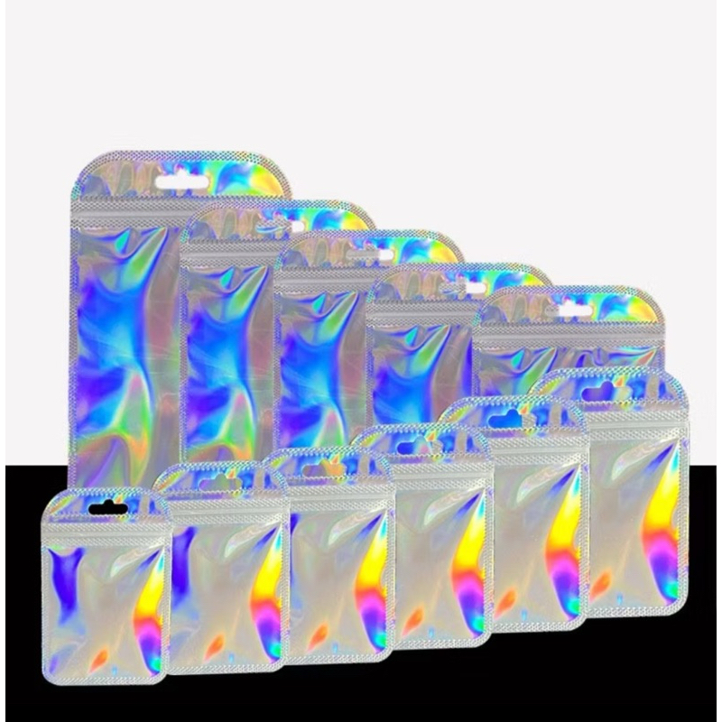 

PLASTIK OPP HOLOGRAM HOLOGRAPHIC POUCH SOUVENIR AKSESORIS ZIPLOCK BENING TEBAL