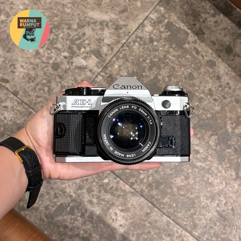kamera analog Canon AE-1 Program Silver & lensa New Canon FD 50mm F1.4 MULUS