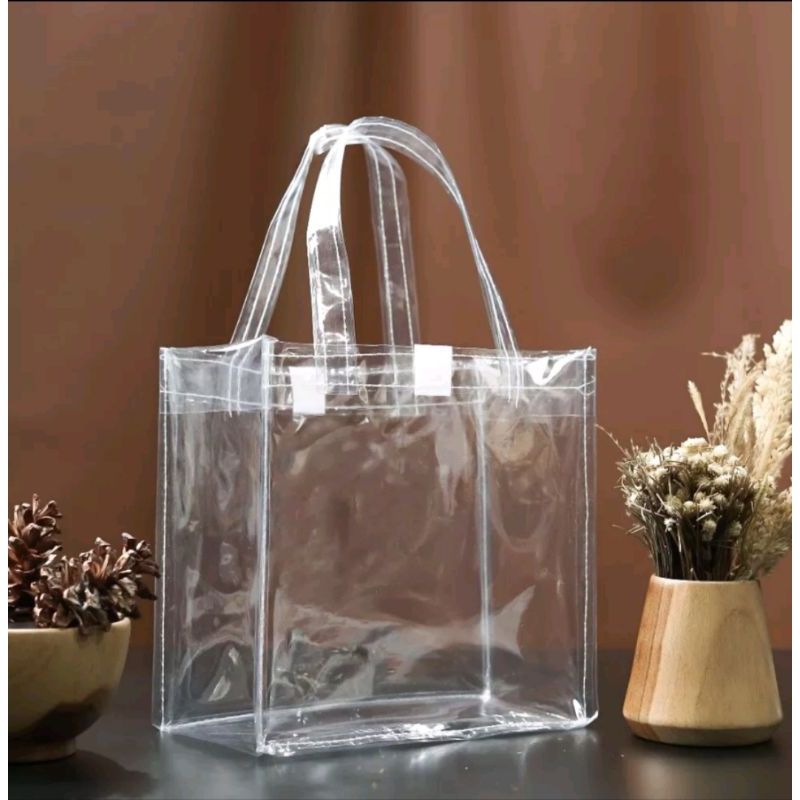 

TAS mika bening transparan panjang 20 tinggi 20 lebar 10