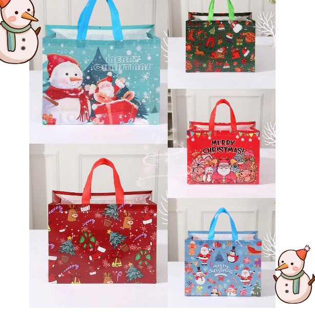 

TAS SPUNBOND MOTIF CHRISTMAS / GOODIE BAG SPUNBOND EDISI NATAL / SPUNBOND BAG CHRISTMAS / TAS GAMBAR SANTA