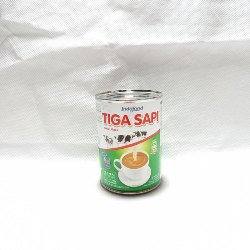 

Indofood Susu Kental Manis Tiga Sapi 490gr - SKM 3 Sapi Topping / Mix / Shake