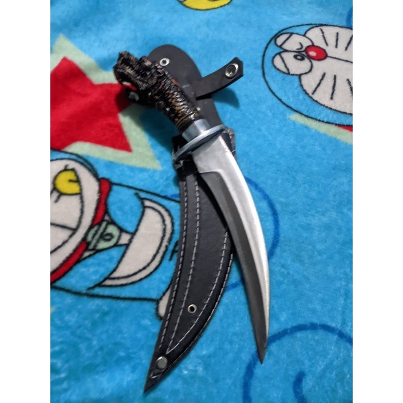 pisau naga resin bahan baja per