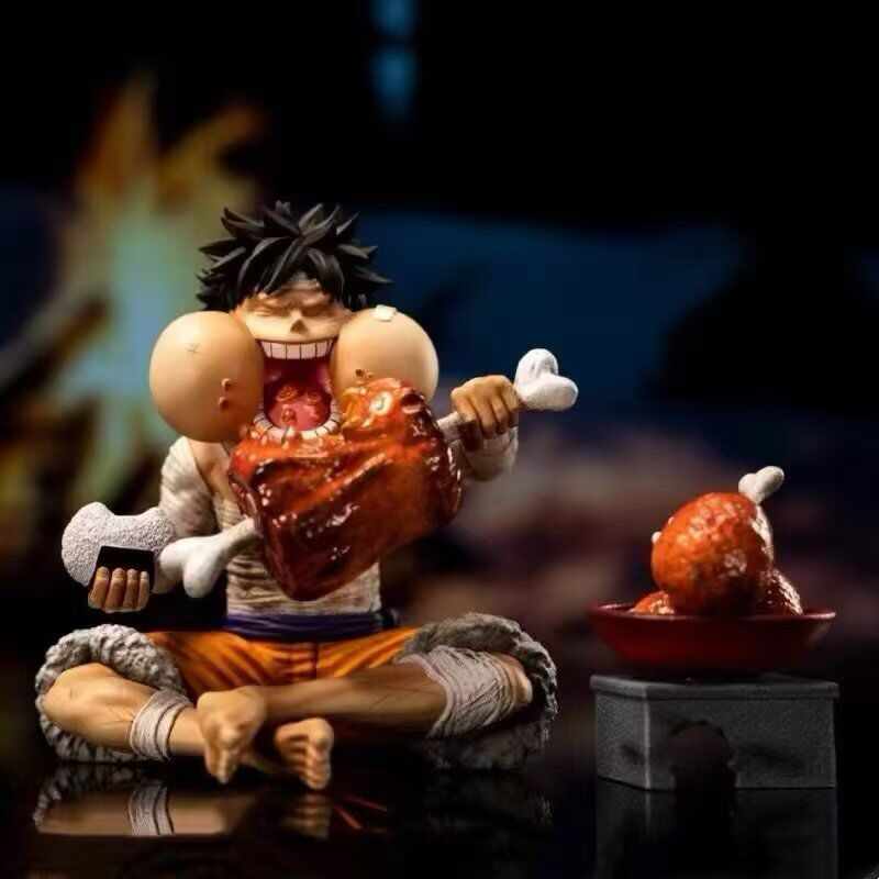 action figure one piece luffy perban duduk makan daging