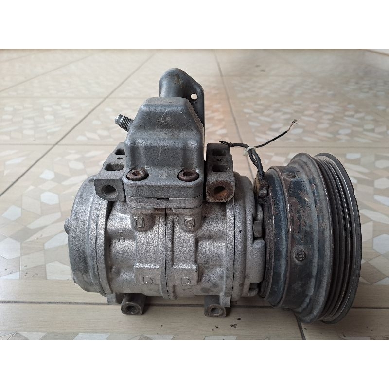 KOMPRESOR DAN MAGNET CLUTCH AC STARLET KAPSUL SECOND
