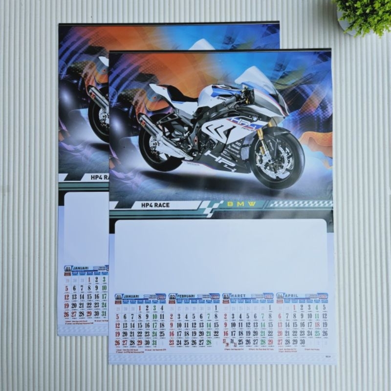 

kalender tahun 2025 BO 31 motor sport 3 lembar x 4 bulan ukuran 38x54cm(terima castume cetak merek)