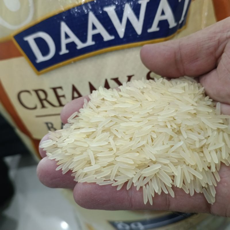 

Daawat Creamy Sella Basmati XXL Repack 1kg kualitas Terbaik dan Panjang Repack 1kg