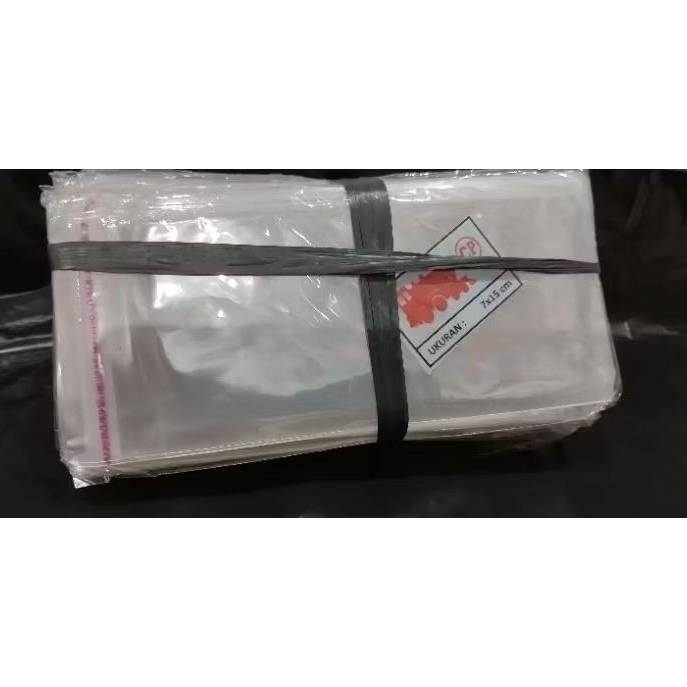 Plastik OPP tebal ada lem UK 7 x 15 cm. CP.