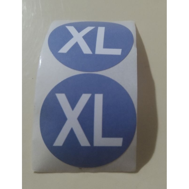 

Stiker Label Size Pakaian / Stiker Ukuran Pakaian "XL" Diameter 2,5cm