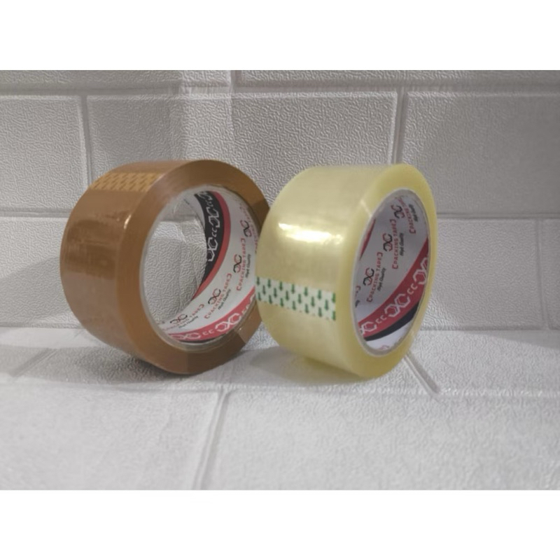 

LAKBAN BENING DAN COKLAT HP TAPE 45mm x 100 yard lakban solatip bening cokelat