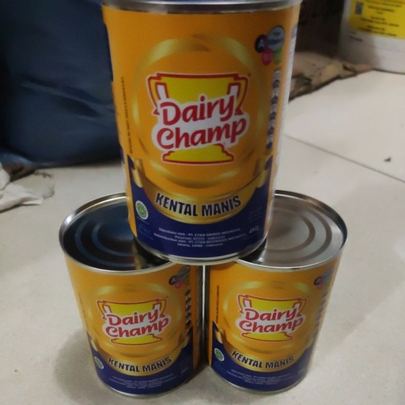 

susu kental manis dairy champ 480gram (100% exp terbaru dan ori)