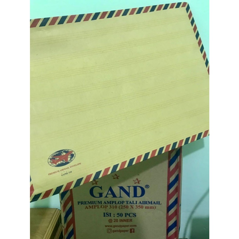 

Amplop Coklat Folio Airmail 310 + Tali - merk GAND (isi 50 lbr)