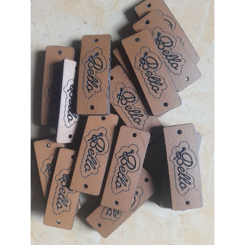 

Label Custom Bahan Kulit Sintetis
