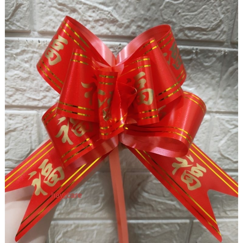 

Pita Tarik Imlek Fu Jumbo 50mm Pita Imlek Gong Xi