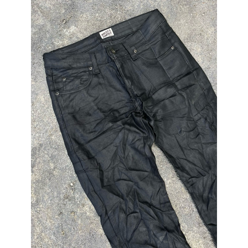 Naked and Famous wax coated black stretch denim