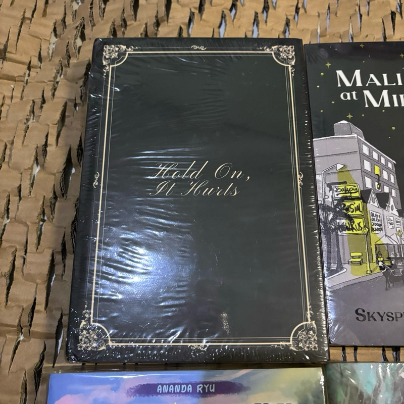 READY STOCK NOVEL HOLD ON IT HURTS SEALED by Noveni Adelia LOTUS IN THE MUD HARD COVER by Annelie