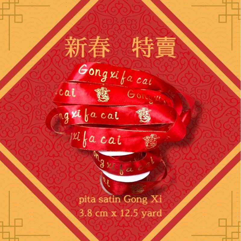 

TOKO ANQA-Pita Kado Pita Satin motif Imlek GONG XI FA CAI Uk 3.8 cm x 12.5 yard