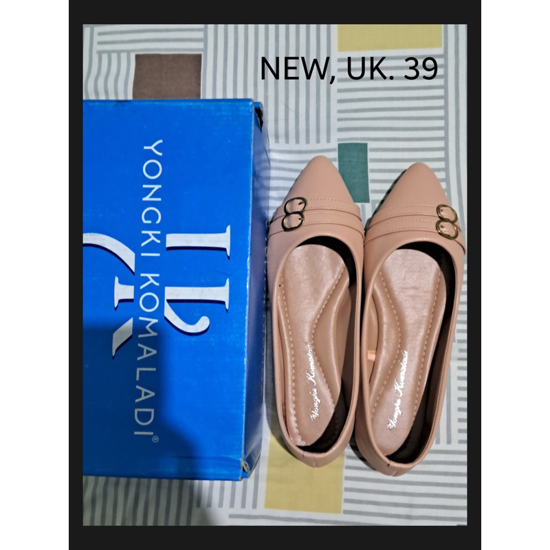 sepatu Yongki Komaladi