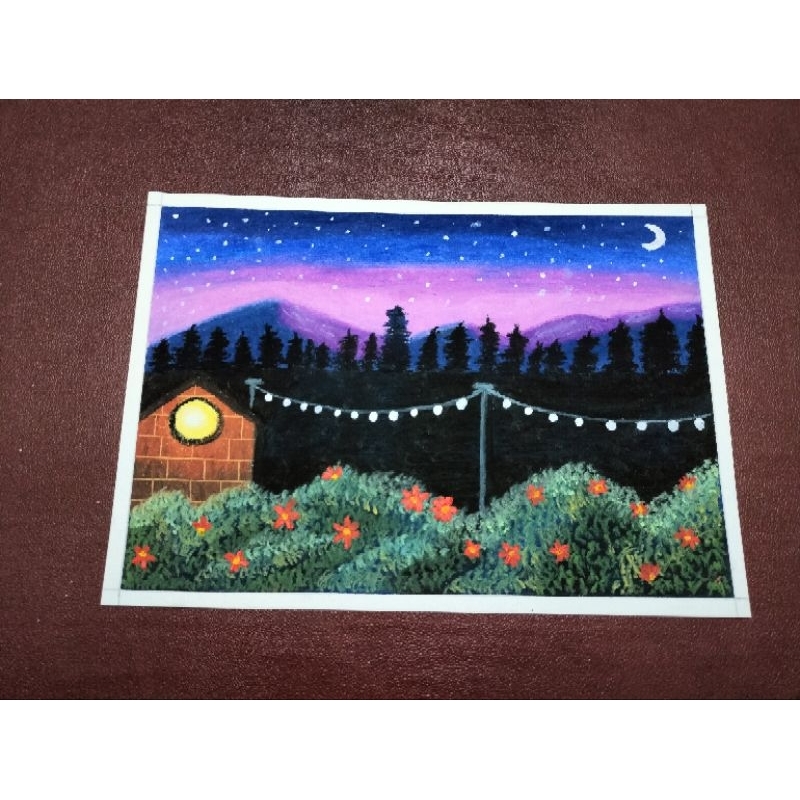 

lukisan gunung dan rumah dengan lampu jalan