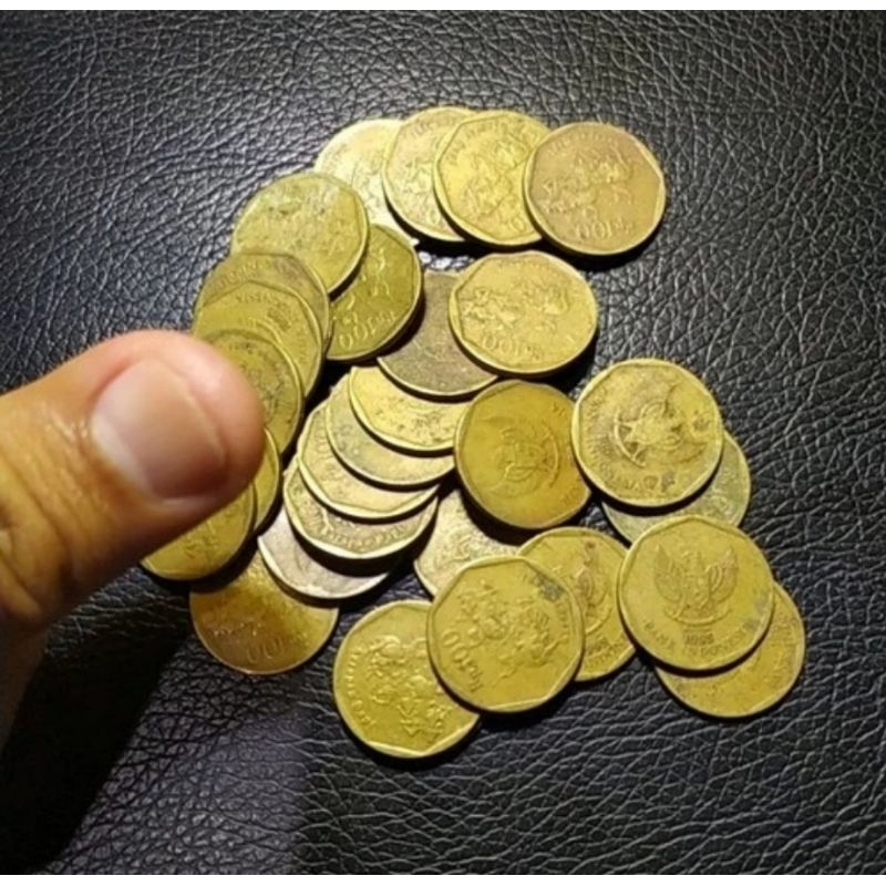 uang koin kuno 100 rupiah karapan sapi kuningan used