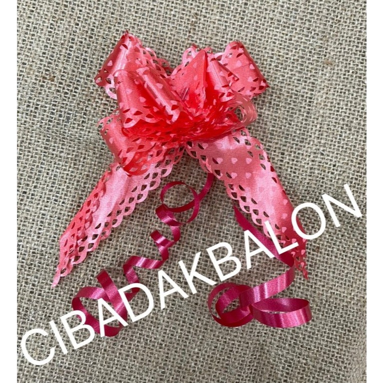 

Pita Tarik Bunga / Pita Serut Bunga / Pita Kado / Pita Hadiah / Pita Bingkisan / Pita Hiasan Parcel