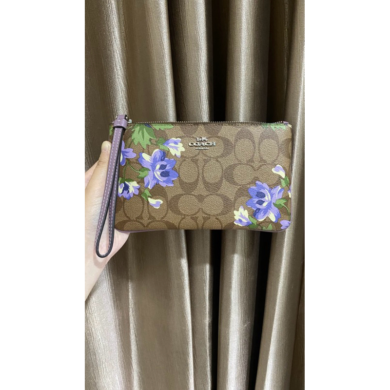 [Preloved] Coach signature coated canvas large wristlet