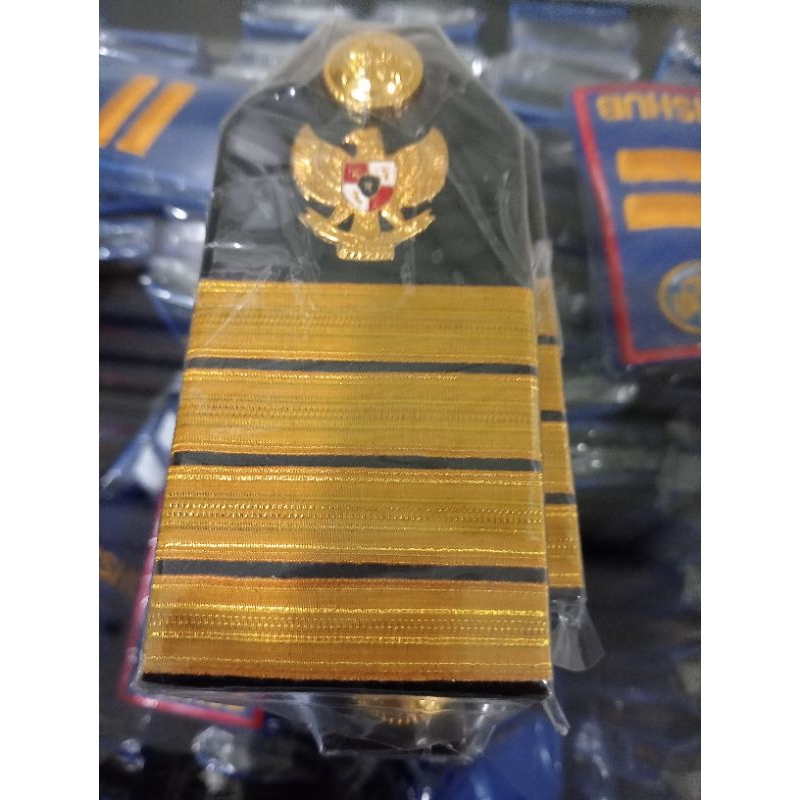 Pangkat PDU evolet pelayaran kancing balok 4