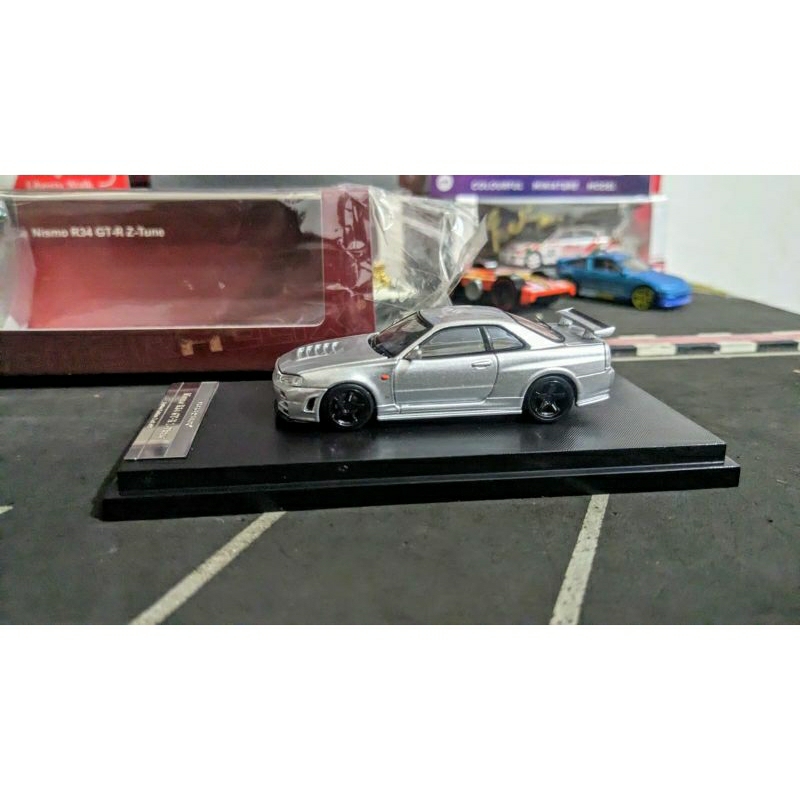 Diecast MotorHelix Nissan Skyline GTR R34 Nismo Z Tune Silver