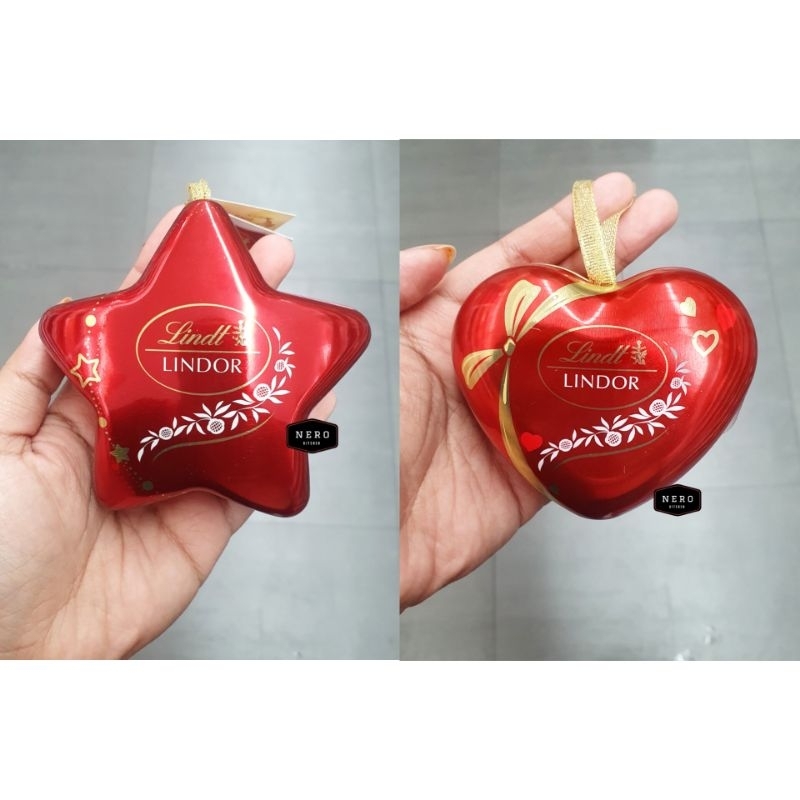 

Lindt Lindor Heart and Star Tin 30gr Limited Edition / Lindt Lindor Special Valentine / Cokelat bentuk jantung / Coklat bentuk hati / Coklat Valentine / Hadiah Valentine / Coklat Jantung / Coklat Hati / Valentine Chocolate / Coklat Import