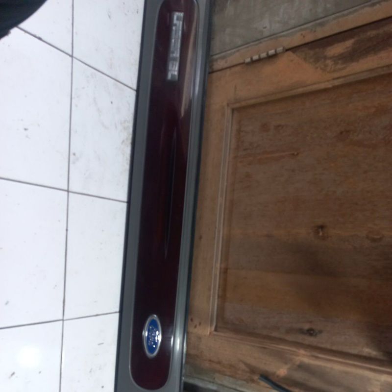 Reflektor Bagasi Ford Laser GL original