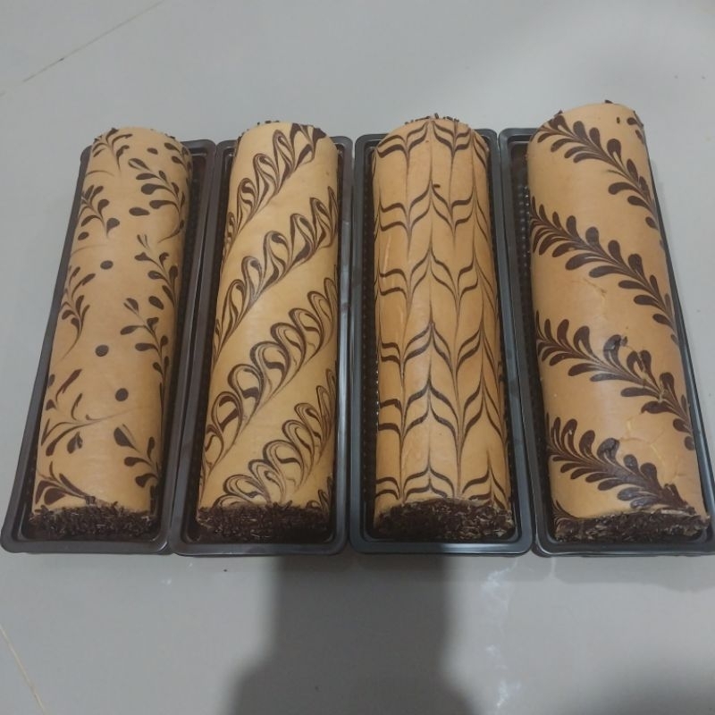 

Bolu Gulung Batik Moist viral