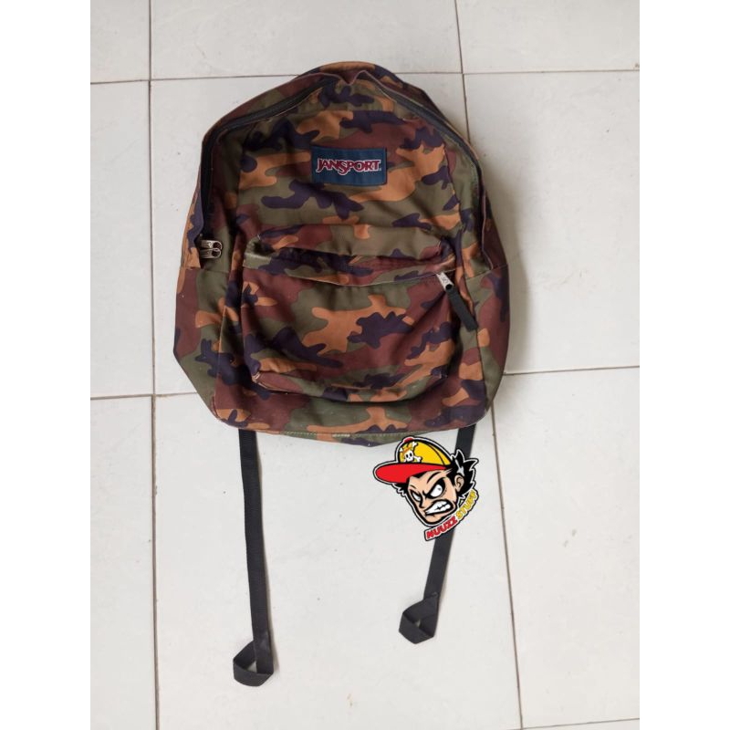tas jansport motif tentara