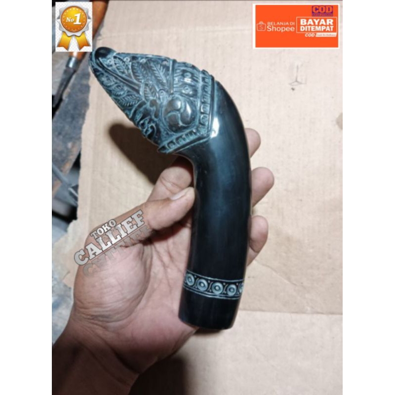 gagang bahan tanduk ukir makara