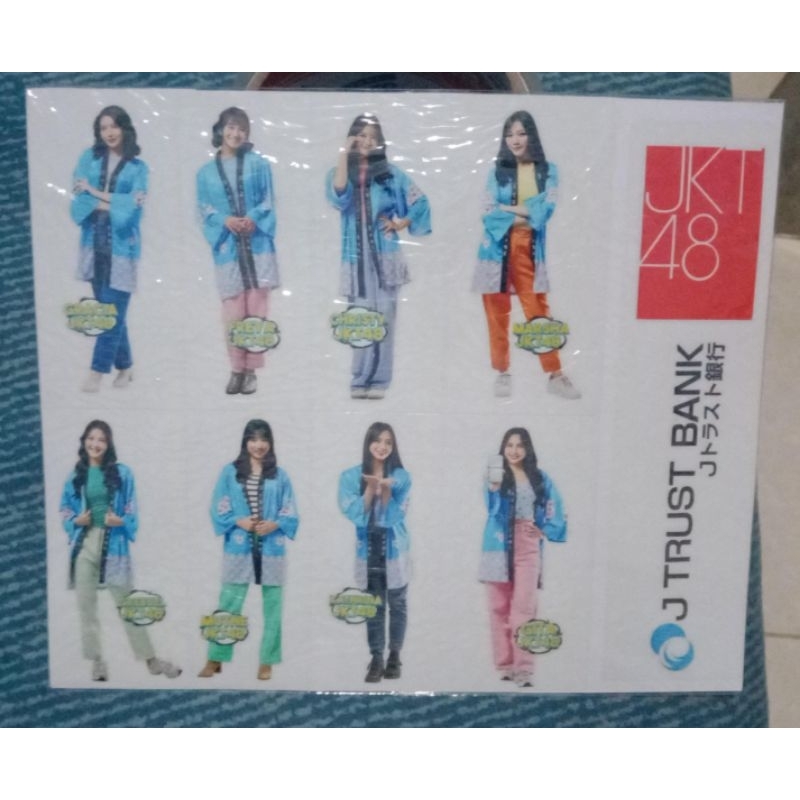 

binder dan stiker jkt48 x jtrust bank