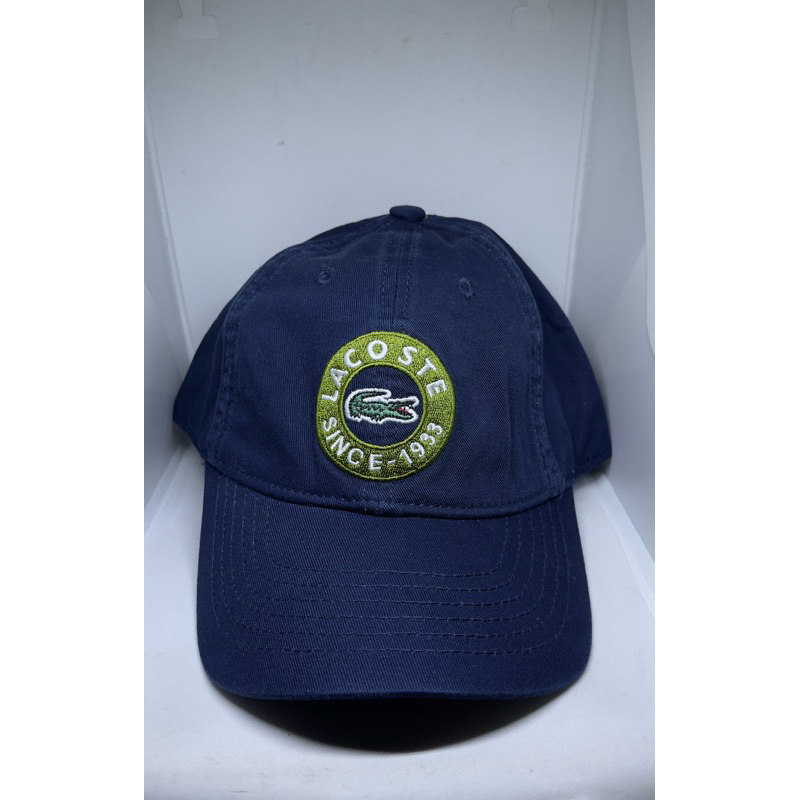 Topi lacoste Logo Bundar