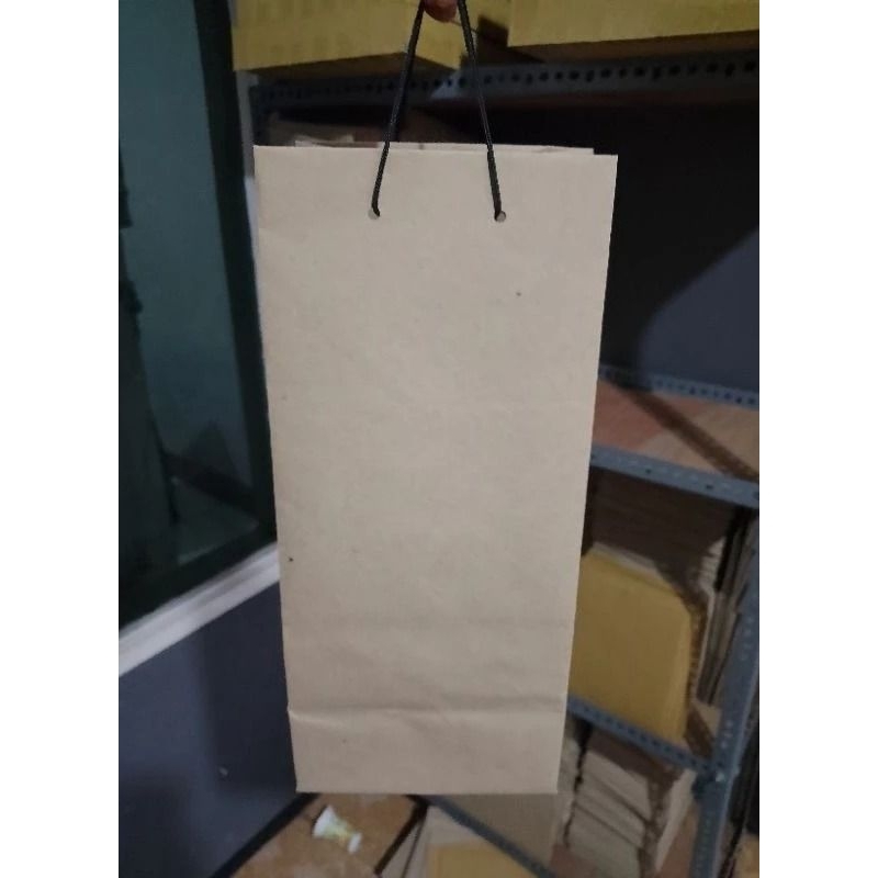 

Paper bag polos coklat 12cm x 12cm x 35cm (Paket isi 12pcs )