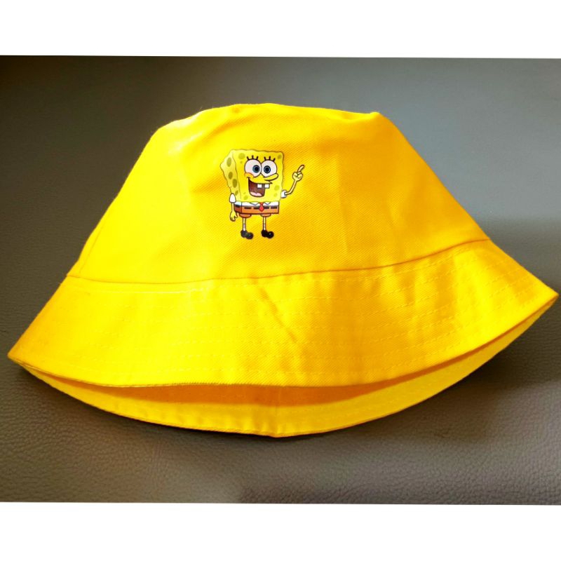 Topi bucket hat anak karakter Spongebob Sponge bob bolak balik reversible kuning motif jadi polos