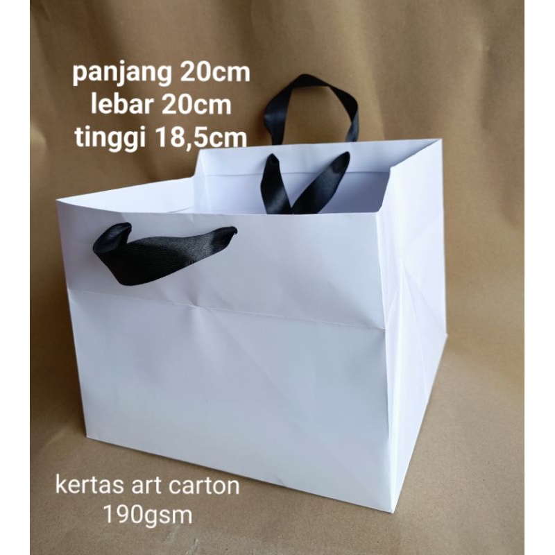 

Paper bag putih P20xL20xT18,5cm untuk dus kotak nasi, tumpeng mini, kue dll, Harga untuk 10 Pcs