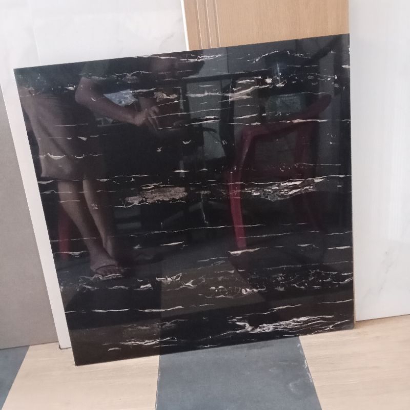 Granit torch ukuran 60x60 hitam motif ab