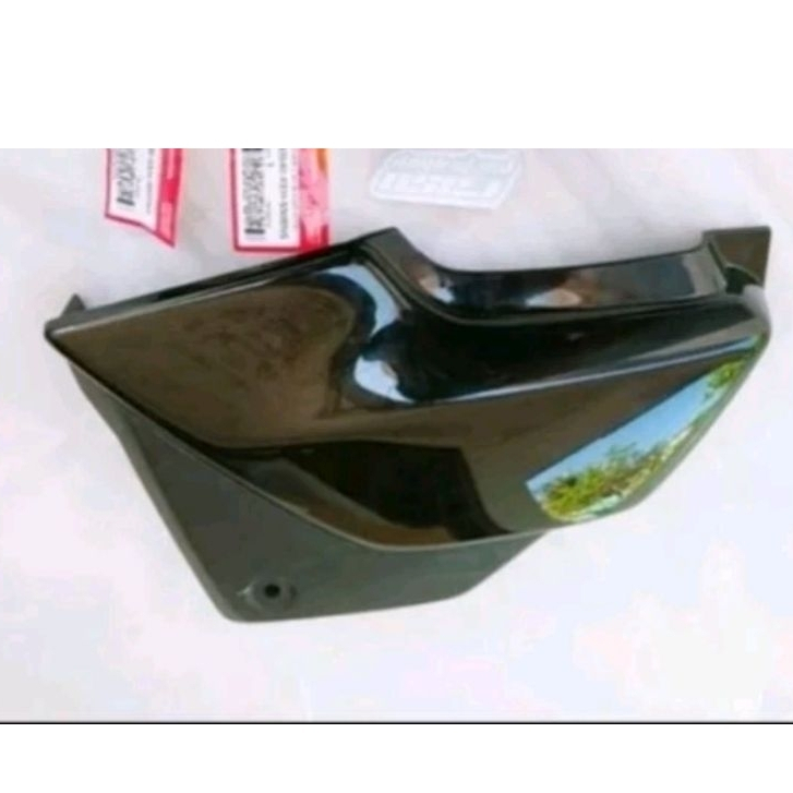 COVER ACCU MEGAPRO LAMA MEGAPRO HIU HITAM KIRI | 83640KEH930BNS 100% ORI AHM
