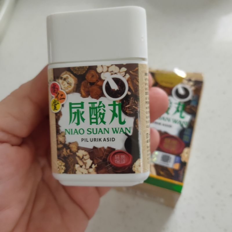 Niao suan wan (pil urik asid)