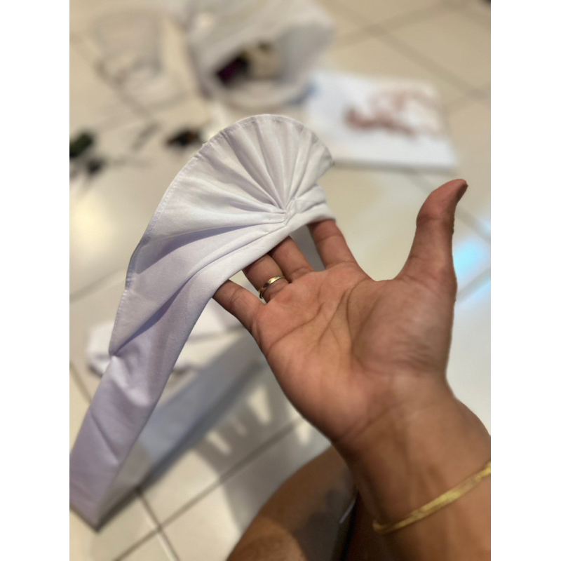 udeng putih setengah jadi bungkulan