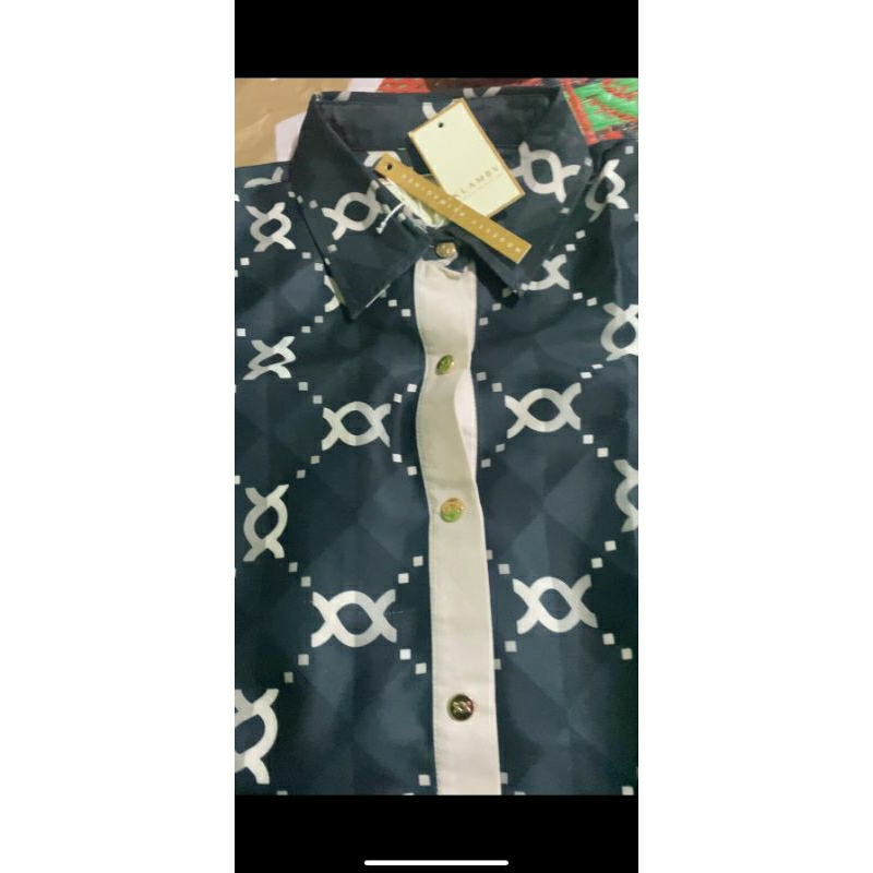 PL wearing Klamby monogram blouse