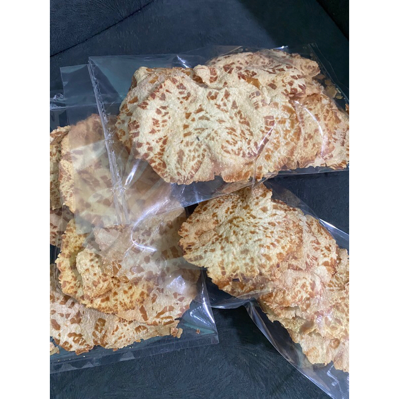 

KERUPUK JENGKOL ASLI PADANG 100% SUDAH DIGORENG PERBUNGKUS